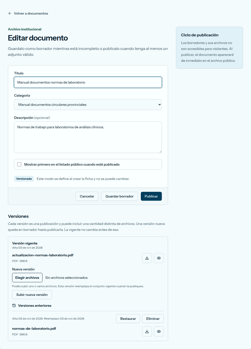 Versión vigente y una versión anterior, con Restaurar y Eliminar